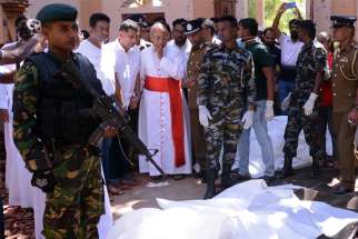 Cardinal Malcolm Ranjith of Colombo, Sri Lanka, looks at the explosion site inside a church in Negombo April 21, 2019, following a string of suicide bomb attacks on churches and luxury hotels across the island. Cardinal Ranjith has finally won a concession from Sri Lanka&#039;s government after widespread criticism of the investigation into the deadly attacks.