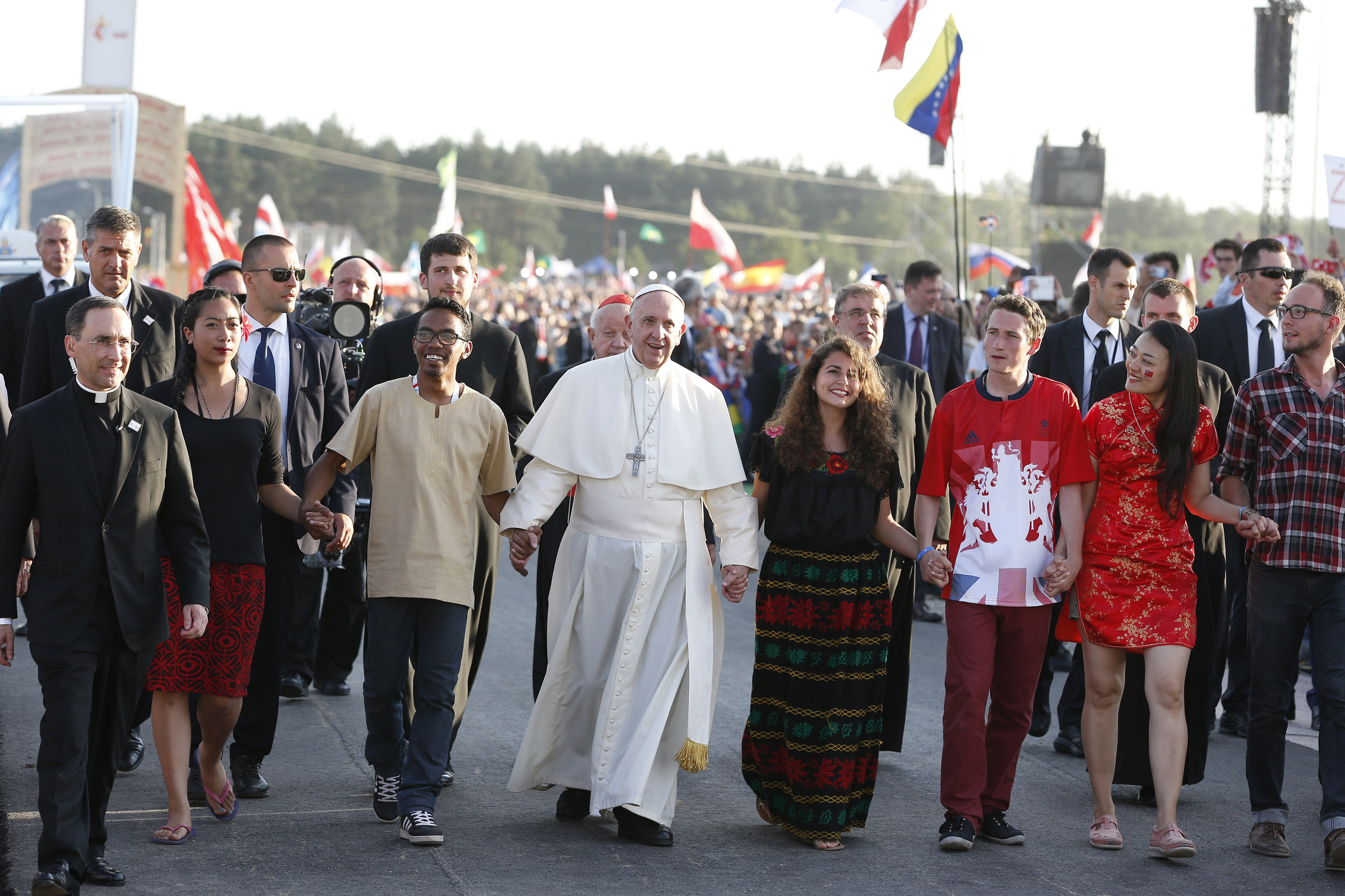 Pope walks with pilgrims