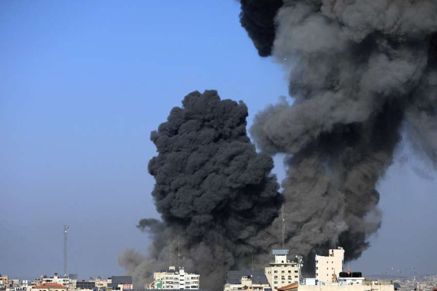 Smoke billows following an Israeli airstrike in Gaza City, Oct. 25, 2023.