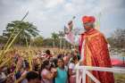 Nicaraguan Cardinal Leopoldo Brenes of Managua blesses people raising their palm fronds during Palm Sunday Mass March 24, 2024, in Managua.